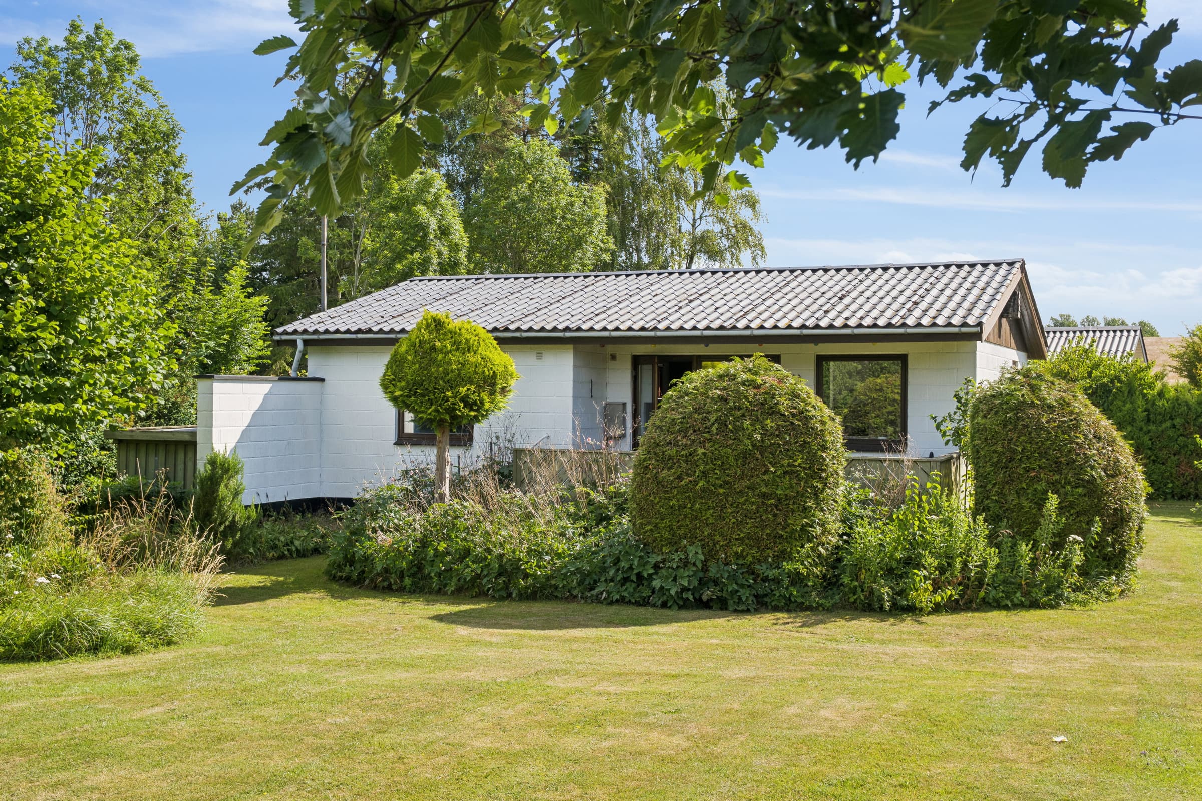 Hyggeligt sommerhus tæt på strand og natur hovedbillede