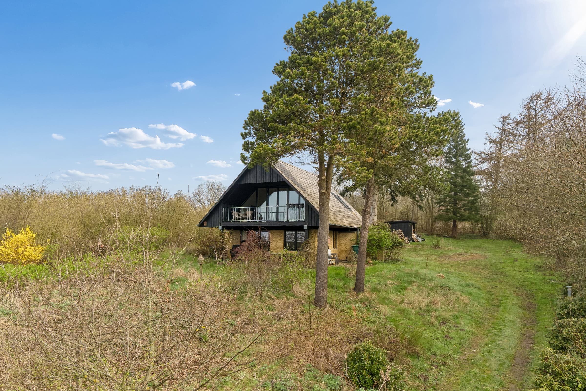 Sommerhus i bakkerne med havudsigt hovedbillede